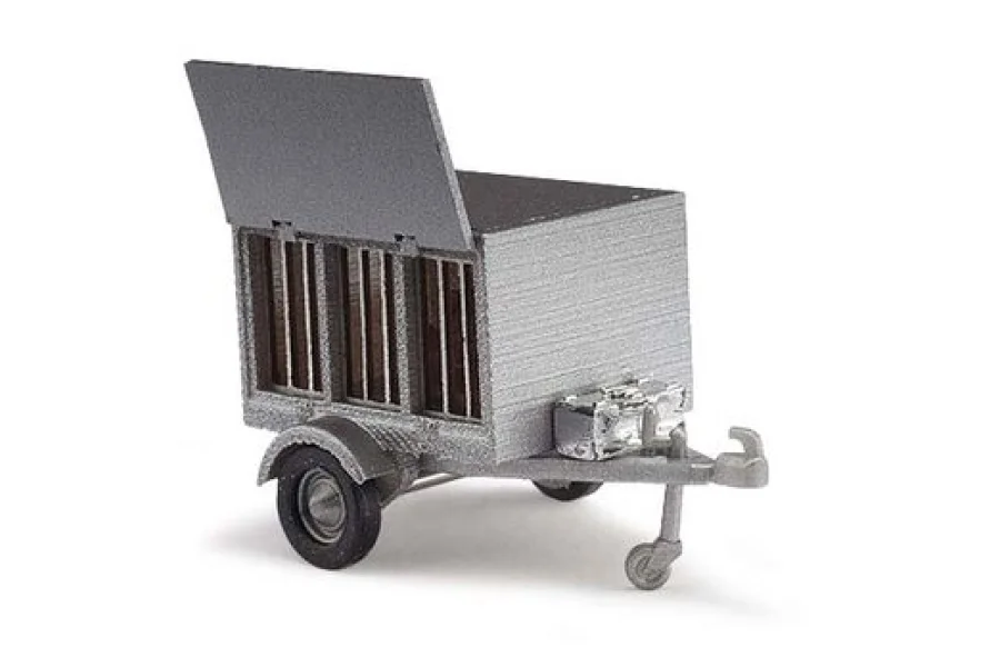 Dog trailer with dog