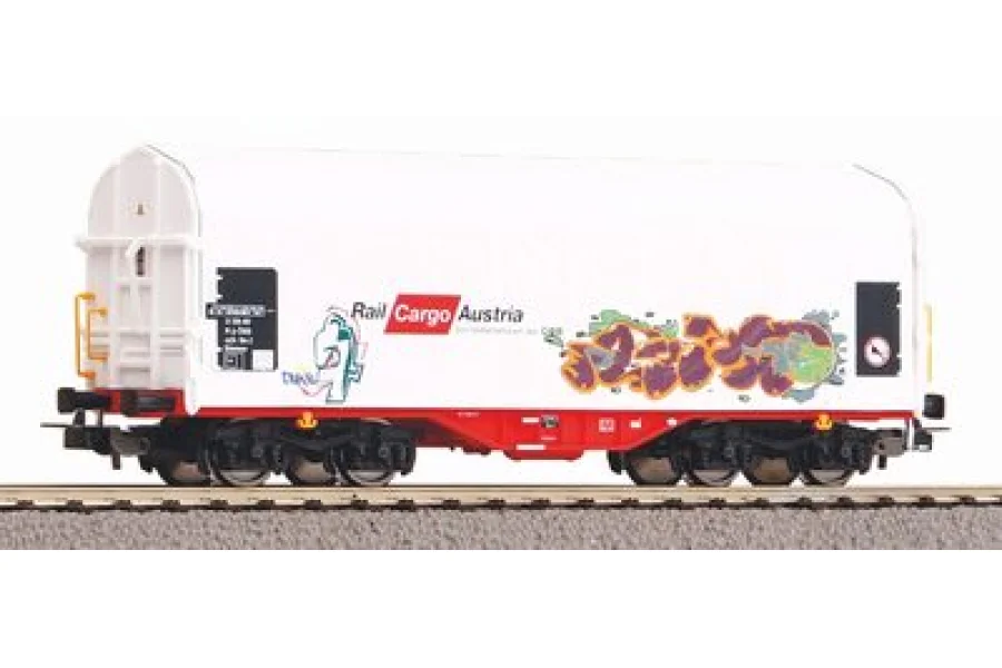 Vagón con toldo corredizo Rail Cargo Austria VI con graffiti